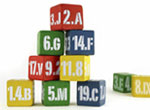 Building blocks with numbers from School Standards written on them.